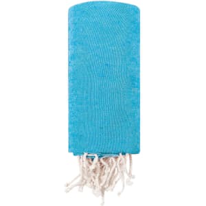 A blue towel pareo featuring white tassels, ideal for beach use. It has a logo on one side.