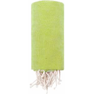 A green towel pareo with white tassels at one end, featuring a logo. Ideal for leisure and outdoor use.