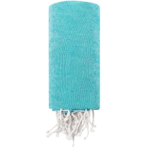 A turquoise towel pareo with white fringe detailing, suitable for beach outings. It has a branding logo.