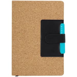 A cork-covered notepad with a black elastic band and a turquoise pen holder. Features a logo on the cover.