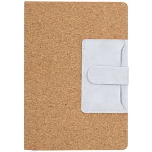 A cork-covered notepad with a white strap closure, featuring a sleek and minimalist design.