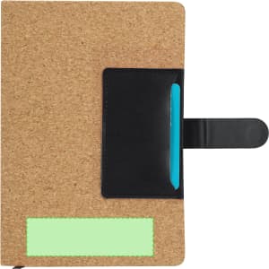 A notepad with a cork exterior, featuring a black pocket and a turquoise pen holder inside.