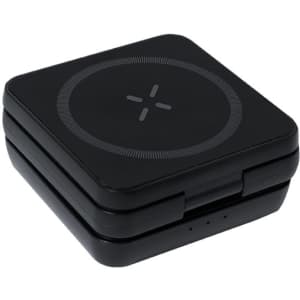 A compact black wireless charger with a circular design and an integrated logo.
