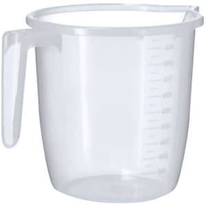 A clear plastic measuring jug with a handle, featuring measurement markings on the side.