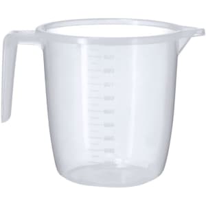A clear plastic measuring jug with a handle and measurement markings on the side.
