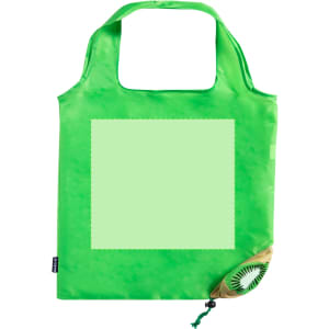A green foldable reusable grocery bag with a section for custom design and a small pocket for storage.