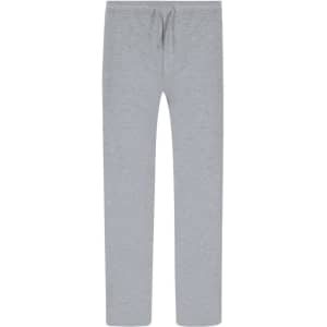Light grey track pants with a drawstring waist and a logo. Simple and casual design.