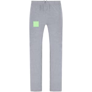 Grey joggers featuring a square accent and a logo on the side. Ideal for casual wear and exercise.