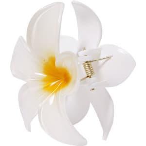 A floral hair clip in white with yellow accents, featuring a spring mechanism and petal design. It has a logo on it.