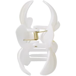 A white hair clip with a spring mechanism, designed for holding hair securely. Features a simple, curved shape.
