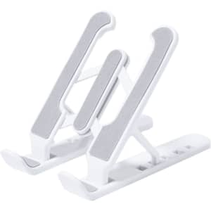 A white phone stand with grey padding on adjustable arms for secure placement of devices. Features a sleek design and logo.