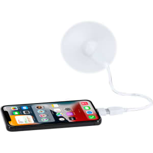 A small, white fan is attached to a smartphone via a flexible cable. The phone displays various app icons.
