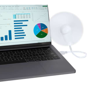 A desktop fan with a suction base is attached to a laptop, alongside a colourful screen displaying charts and graphs.
