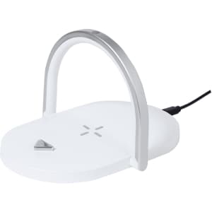 A white multifunction lamp with a silver handle, designed for wireless charging. It has a sleek, modern look.