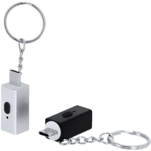 A silver and black electric lighter keyring featuring a small button, attached to a keychain with a metal ring.