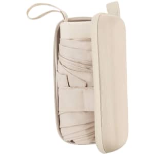 A foldable umbrella in a beige carrying case, neatly stored and secured with a strap.