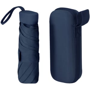 A navy foldable umbrella displayed in a protective case, featuring a sleek design and a logo.