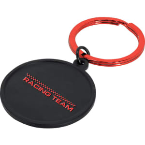 A black keyring with a circular shape and a red metal keyring attachment, featuring a logo.