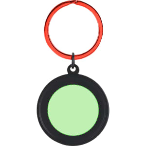 A black keyring with a circular design and a light green centre, featuring a red metal attachment.
