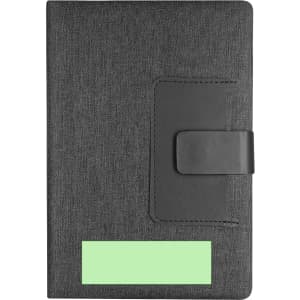 A black notepad with a textured cover and a green accent, featuring a closure strap and a small pocket.