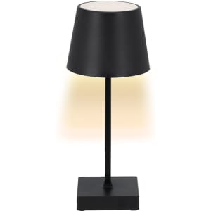 A black lamp featuring a conical shade and a square base, with a warm light illuminating the top.