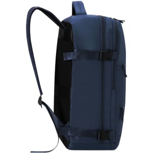 A navy blue backpack with adjustable straps and multiple zippered compartments. It features a logo.