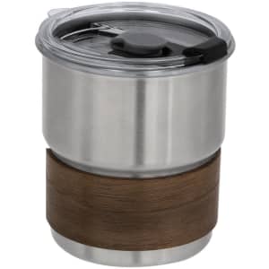 A drink bottle with a stainless steel body, featuring a wooden base and a transparent lid. It has a black closure mechanism.