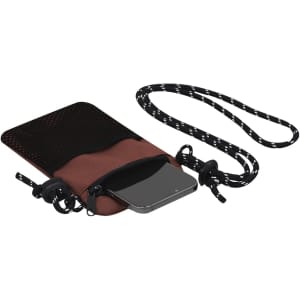 A multipurpose bag in brown with a black mesh pocket and adjustable strap, featuring a smartphone inside.