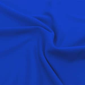 A vibrant blue fabric T-shirt material, featuring a smooth texture and softness. The image highlights the deep blue hue.