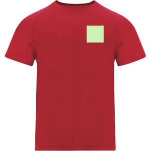 A red adult T-shirt featuring a small green square patch. The shirt has a logo or branding present.