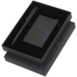 A black gift set featuring a pen and a notebook, presented in a sleek black box with a logo.