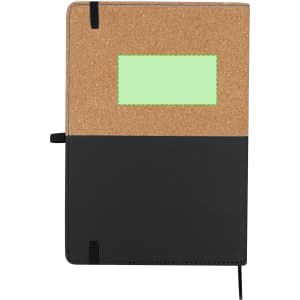 A notepad with a cork top cover and a black bottom section, featuring a placeholder for a label and an elastic band.