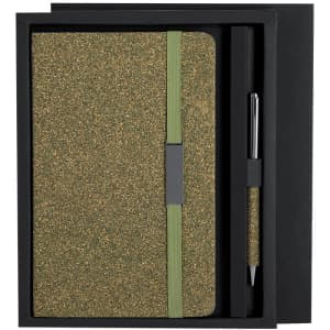 A green textured notebook with an elastic band and a matching pen, presented in a black gift box.