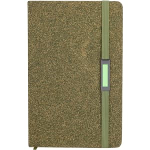 A green notebook with a textured cover and an elastic band closure, featuring a small logo.
