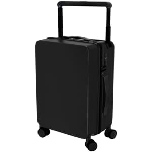 A black wheeled trolley bag with a retractable handle and four wheels for easy transport. It features a sleek design and branding.