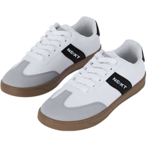 A pair of white and grey trainers with a black accent and logo on the side.