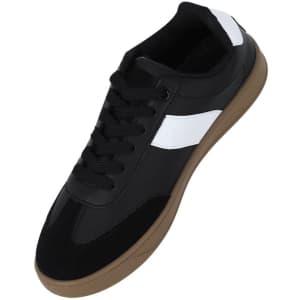 A black and white sneaker featuring a lace-up design with a brown sole and a logo on the side.