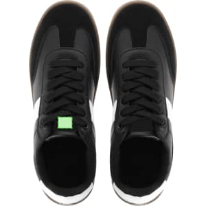 A pair of black trainers with a white logo and detailing, featuring laces and a gum sole.