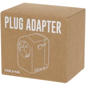 A brown cardboard box containing a white plug adapter. The adapter features multiple ports and has a simple design.
