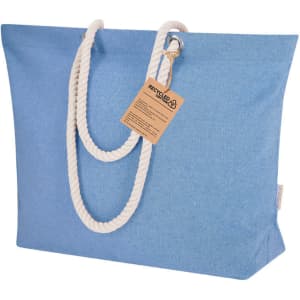 A blue tote bag with white rope handles and a tag attached. Made from recycled materials.