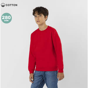 A red sweatshirt made of cotton, featuring long sleeves and a crew neckline, modelled by a young boy.