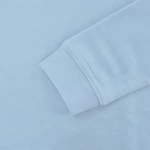 A light blue sweatshirt featuring a smooth texture and cuff detail, with a logo on the fabric.