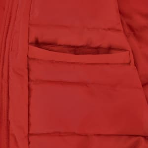A close-up of a bright red puffer jacket featuring a small inner pocket. The jacket has a smooth finish and a zipper.