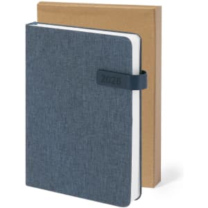 A blue diary with a textured cover, featuring an elastic band, alongside a brown kraft cover.