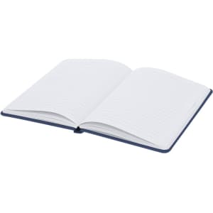 An open notepad with lined pages featuring a navy blue cover and white inner pages. It has a branding logo on the cover.