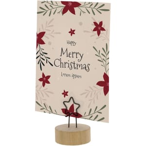 A decorative stand holding a card with a floral design and the text "Merry Christmas," featuring red and green colours.