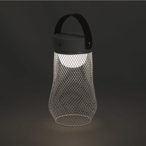 A metallic mesh lamp with a black handle, featuring a warm white light, set against a dark background.