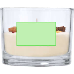 A clear glass candle holder containing a creamy white candle, adorned with decorative elements on top.