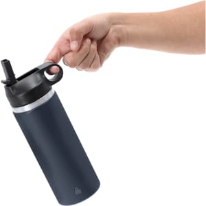 A drink bottle in navy blue with a black lid and built-in straw, held by a hand. It features a logo.