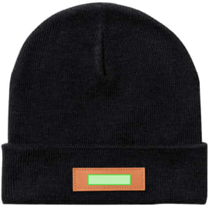 A black beanie hat with a leather patch featuring a logo or branding on the front.